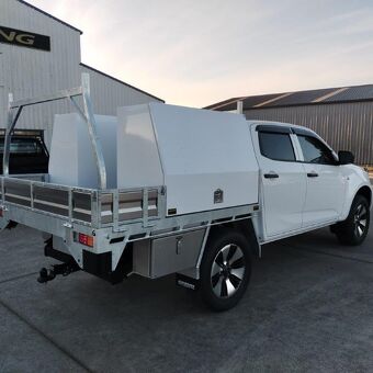 White ute fitted with a custom alloy tray and enclosed service canopy designed and built by Gibbons Engineering.