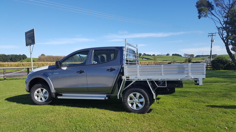Aluminium flat deck ute tray designed and manufactured by Gibbons Engineering on a silver double cab ute.