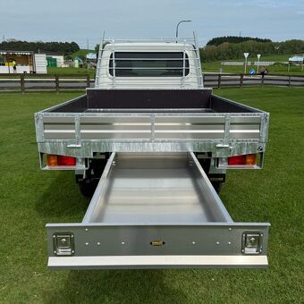Rear view of a custom aluminium ute tray with extended slide out storage drawer built by Gibbons Engineering.