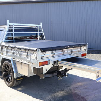 Galvanised ute tray with rear slide out storage drawer and tonneau cover designed for practical trade use by Gibbons Engineering.