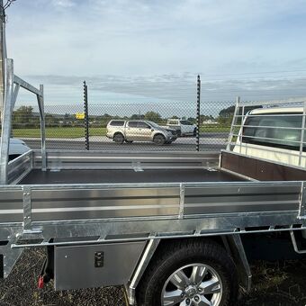 Heavy duty galvanised flat deck ute tray with underbody toolboxes manufactured by Gibbons Engineering.